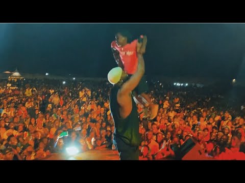 Eddy Kenzo adopted this little girl that joined him on stage while performing in his childhood town.